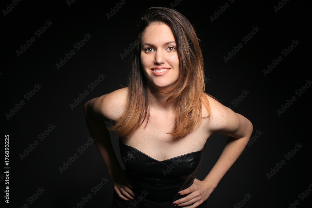 Seductive girl in a black dress forward Seductive girl in a black dress forward