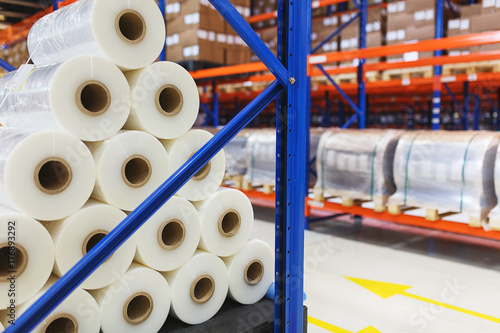 system of address storage of products, materials and goods in a warehouse. Rolls of polyethylene film in stock. 