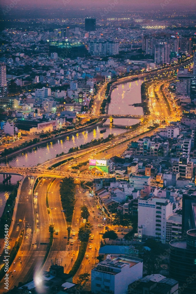 Saigon river in Ho Chi Minh city by night, Vietnam