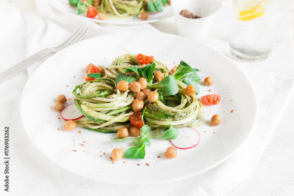 Raw zucchini spaghetti with pesto and chickpeas Raw zucchini spaghetti with pesto and chickpeas