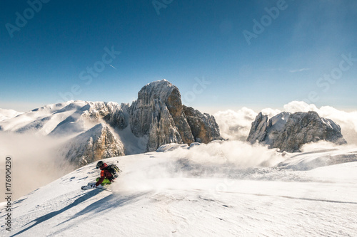 freerider skiing in big mountains photo