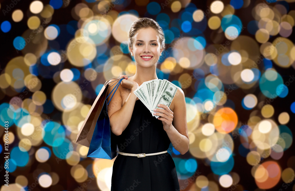 smiling woman in dress with shopping bags smiling woman in dress with shopping bags