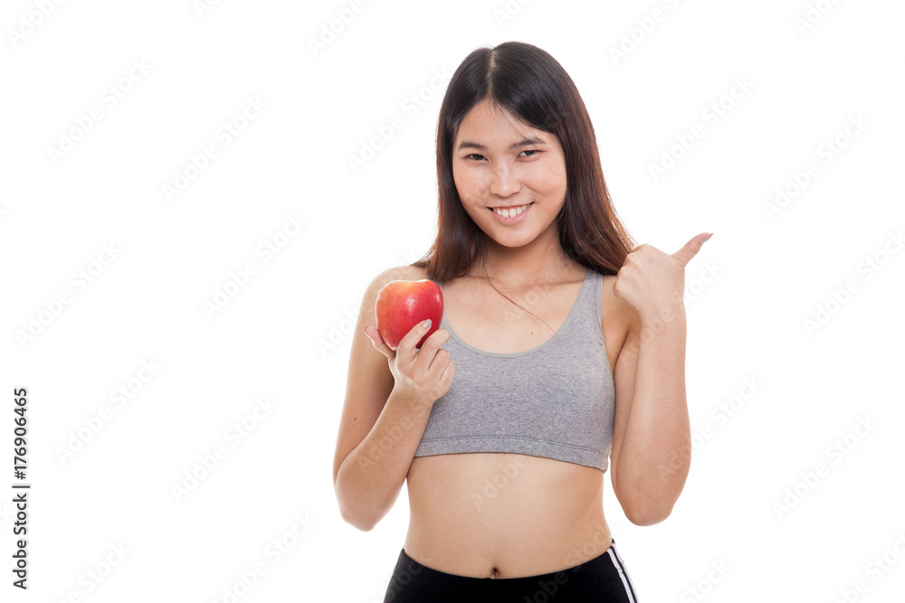 Beautiful Asian healthy girl thumbs up with apple. Beautiful Asian healthy girl thumbs up with apple.