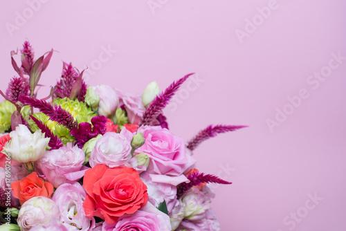 beautiful floral arrangement, pink and red rose, pink eustoma, yellow chrysanthemum