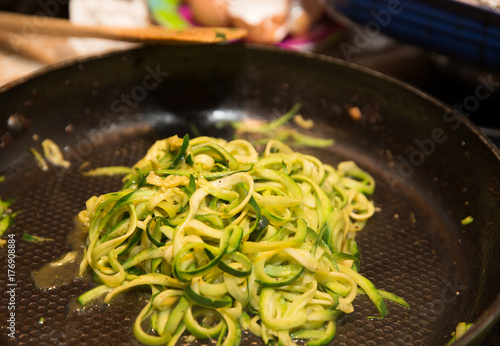 Sliced Green Veggies Cooking in Pan photo