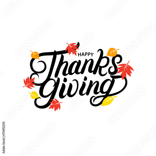 Happy Thanksgiving hand written lettering with brigth fall leaves.