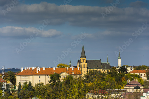 Lighten Prague during nice sunny day. Clear blue sky over czech landmarks.