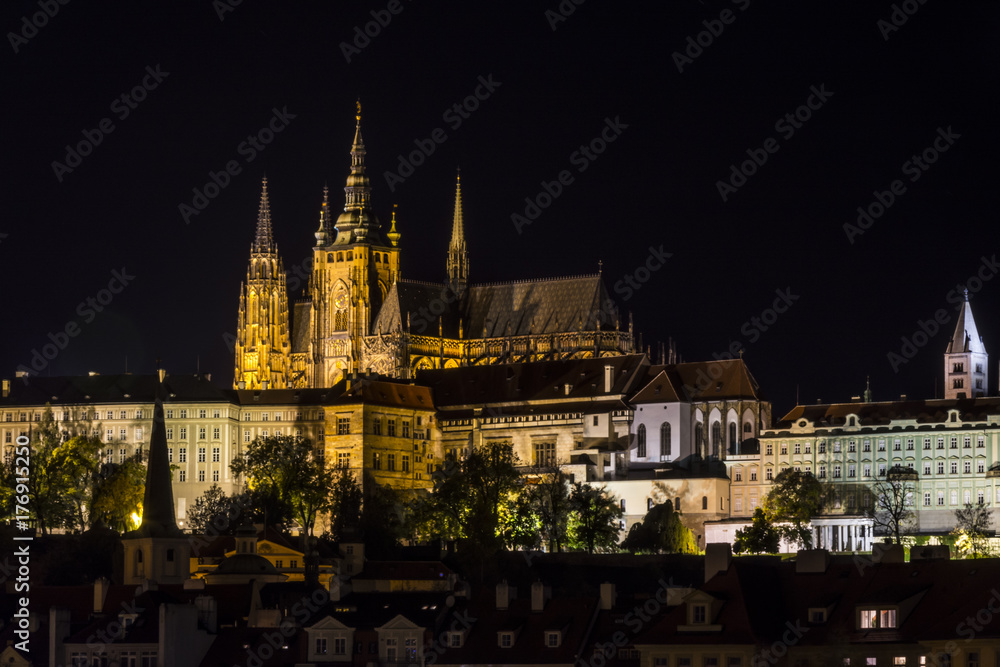 Fototapeta premium Prague castle complex with st Vitus cathedral at night. Traditional view on the Prague castle illuminated by lights.Prague. Hradcany. Czech Republic