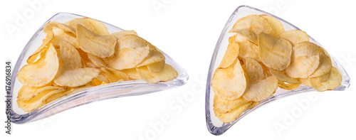 Two portions of crunchy salty potato chips. Fried crisps in triangular glass bowls isolated on white background.