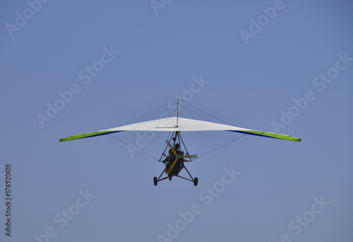 Trike, flying in the sky with two people