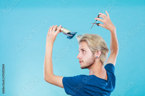 Man going to shave his long hair