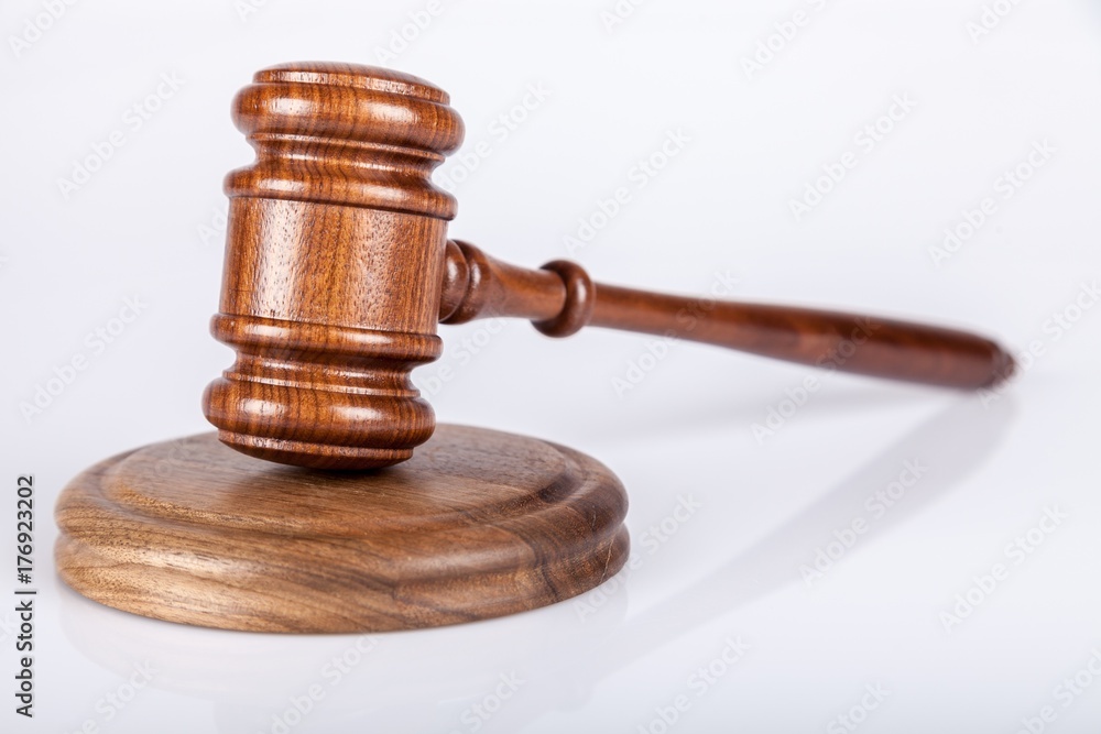Wooden gavel on a background. Wooden gavel on a background.