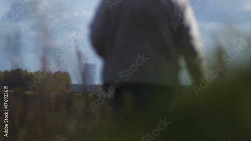 Belarusian nuclear power plant. The person is walking. Astravets. photo