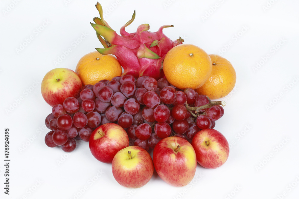 Mixed fruits as Red seedless grapes,orange,apple,Dragon fruit,Japanese golden melon. Mixed fruits as Red seedless grapes,orange,apple,Dragon fruit,Japanese golden melon.