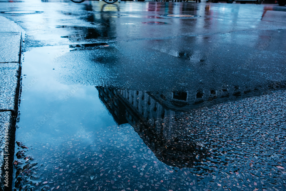 cold colored puddle on a road