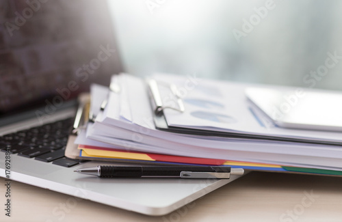 Businessman working reading documents graph financial to job succes Analyze document plans photo