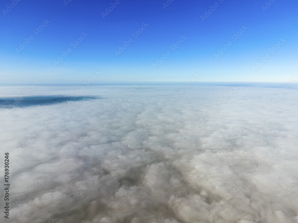 Obraz premium In the skies above the fog. Sunrise over the fog. Clouds near th