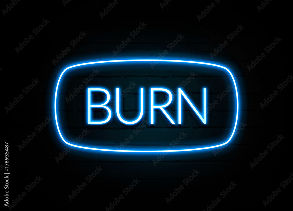Burn - colorful Neon Sign on brickwall Burn - colorful Neon Sign on brickwall