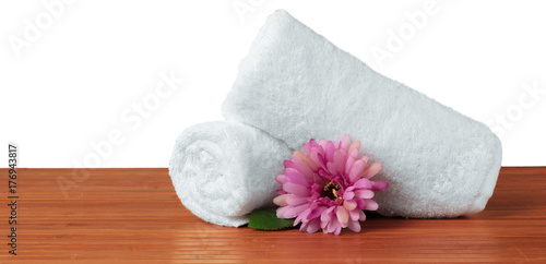 flower with stack of white towel