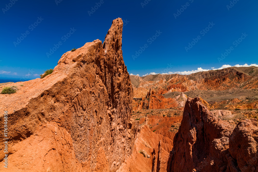 Red rocks under the blue sky in the canyon Skazka, Kyrgyzstan