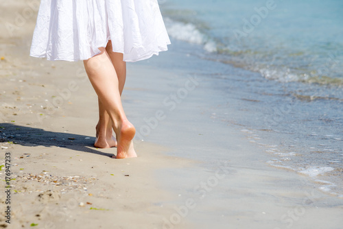 Beach travel - woman walking © nickolya