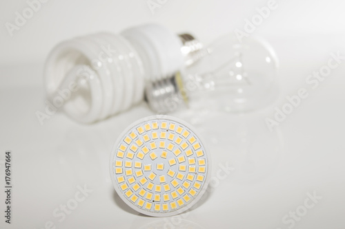 Several different led bulbs and compact fluorescent lamps photo