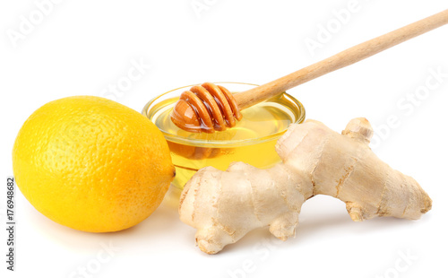 healthy background. ginger with lemon and honey isolated on white background close up