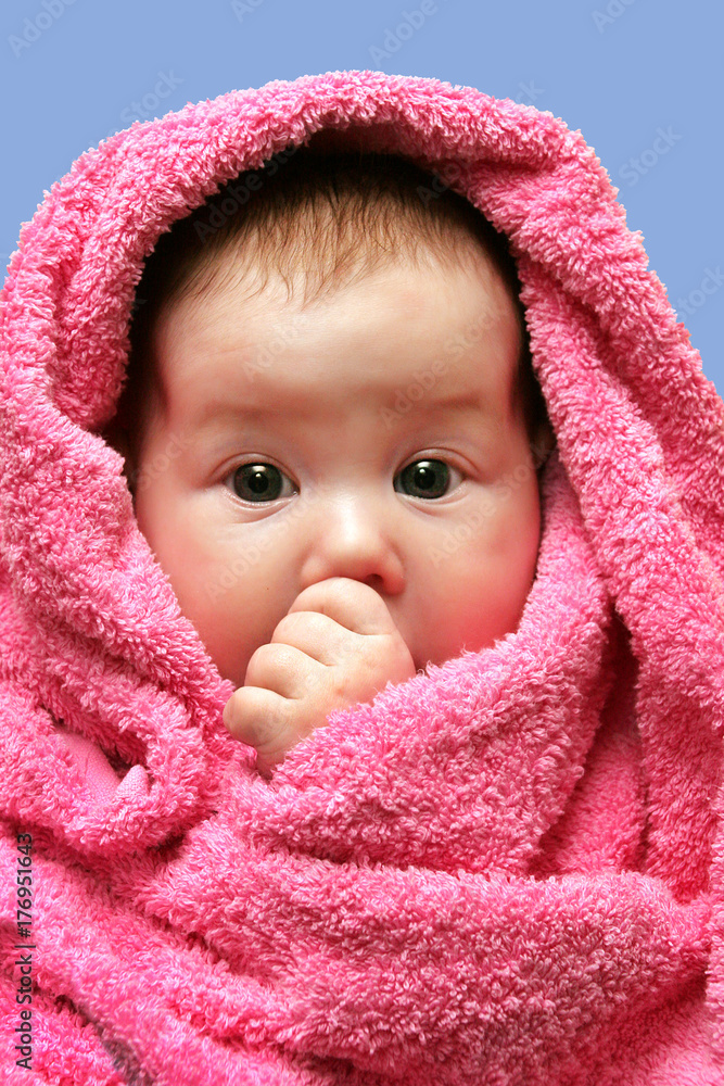 portrait of a baby infant in towel portrait of a baby infant in towel