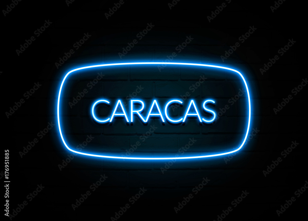 Caracas  - colorful Neon Sign on brickwall
