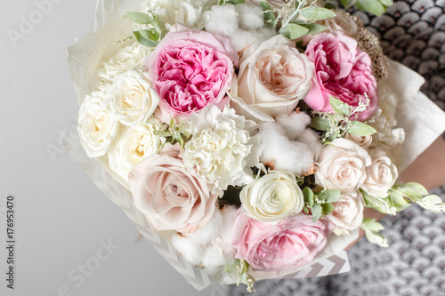 Mix flowers. Luxury bouquets in the girl s hands
