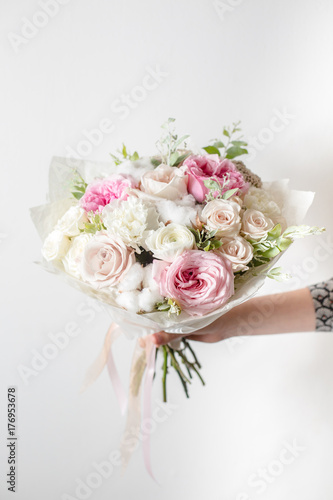 Mix flowers. Luxury bouquets in the girl's hands © malkovkosta