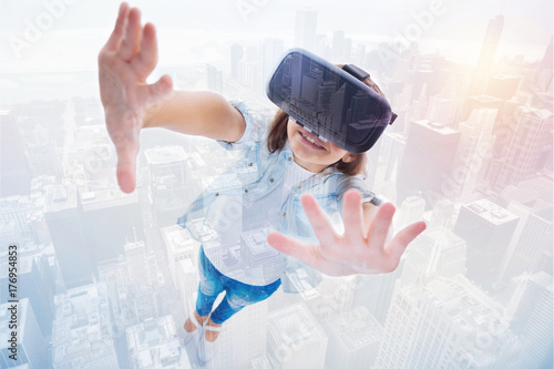 Collage of girl in VR headset raising up her hands