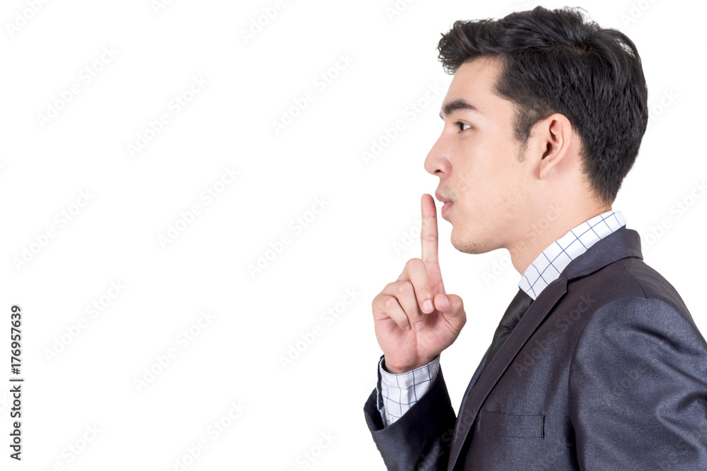 Businessman quiet gesture with finger isolated on white background Businessman quiet gesture with finger isolated on white background