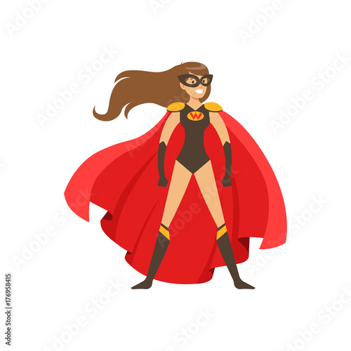 Woman superhero in classic comics costume with red cape photo