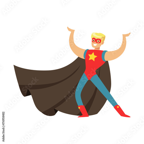 Male superhero in cape posing and showing muscles