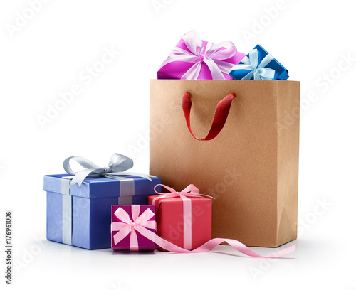 Shopping bag full of gifts isolated on with background