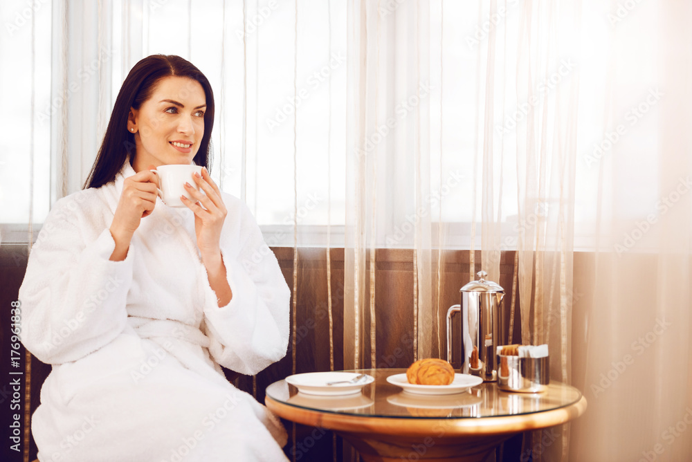Dreamy female person drinking tea Dreamy female person drinking tea