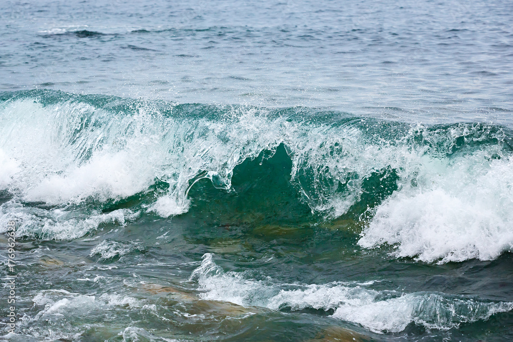 Storm wave on the coast of the Arctic. Barents sea, Russia. Storm wave on the coast of the Arctic. Barents sea, Russia.