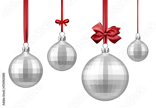 Silver Christmas balls with red bow.