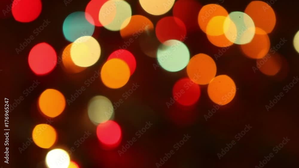 shimmering multicolored lights. abstract background. bokeh from a Christmas garland shimmering multicolored lights. abstract background. bokeh from a Christmas garland