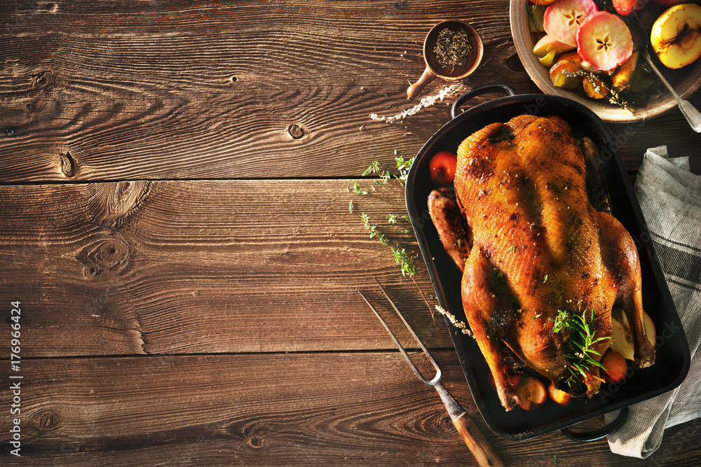 Roast Christmas duck with apples Stock Photo | Adobe Stock