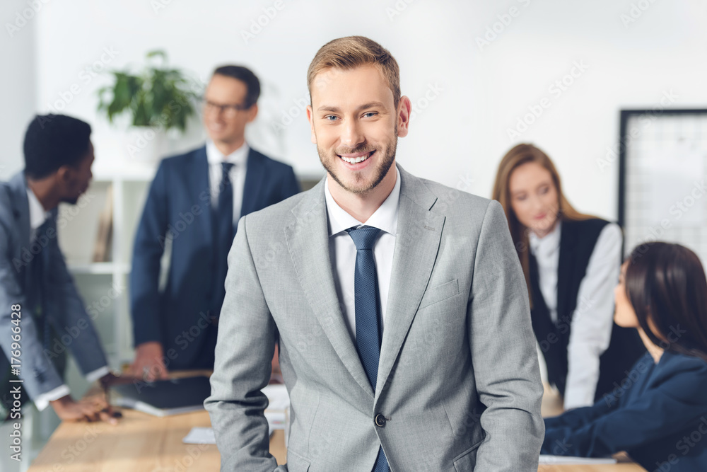 young manager looking at camera young manager looking at camera