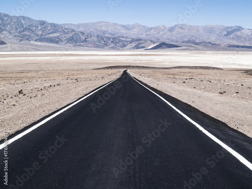 Deserted road through Death Valley National Park, Nevada, United States of America.