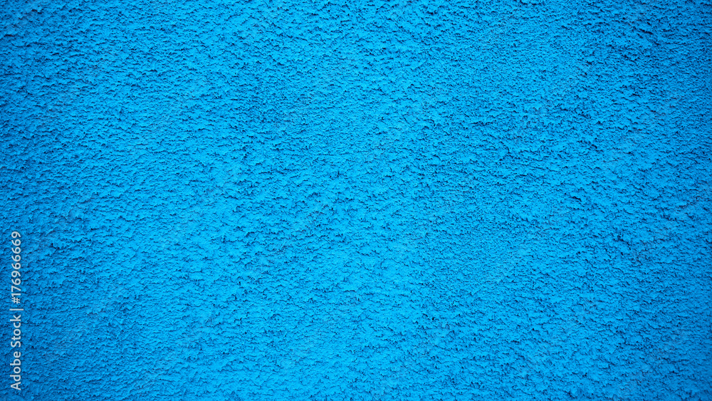 Obraz premium Blue wall stucco vintage style background. Painted surface, an old concrete building in city.