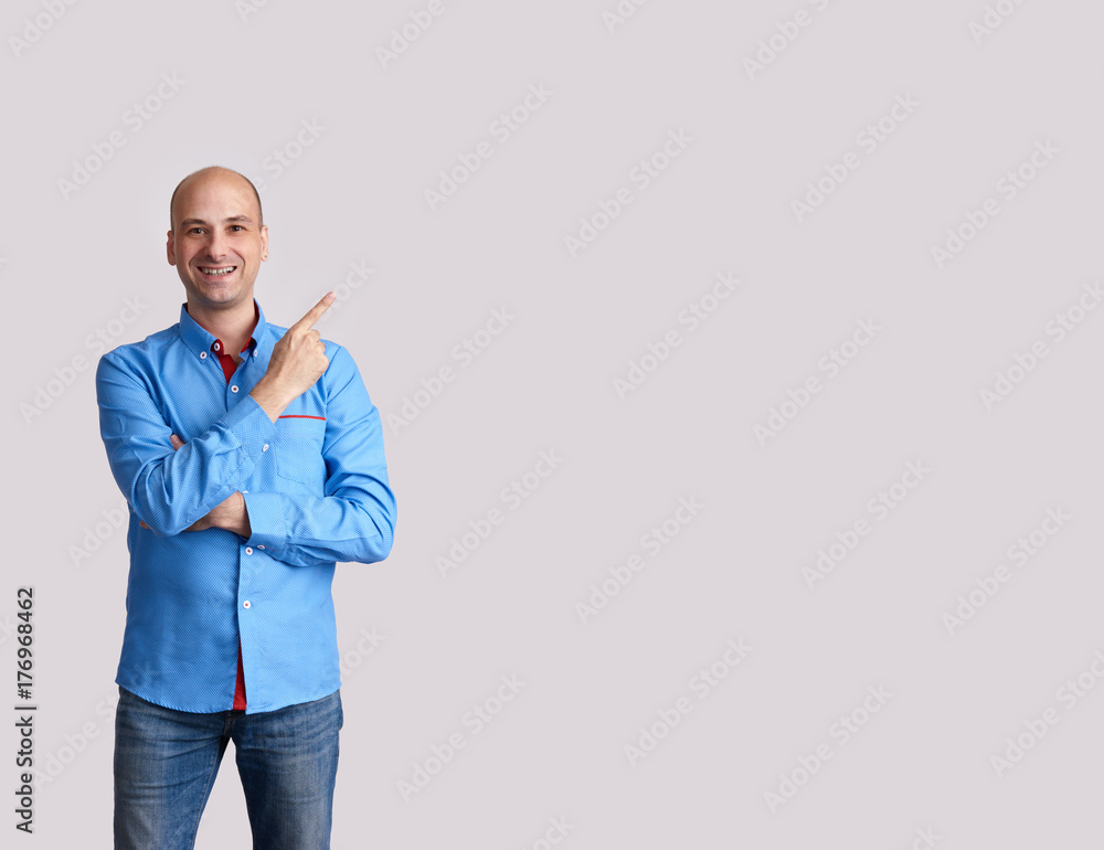 happy bald man pointing finger happy bald man pointing finger