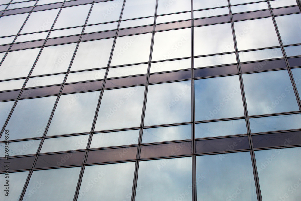 Modern building. Modern office building with facade of glass. Modern building. Modern office building with facade of glass.