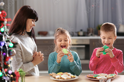 Family eating tasty Christm...