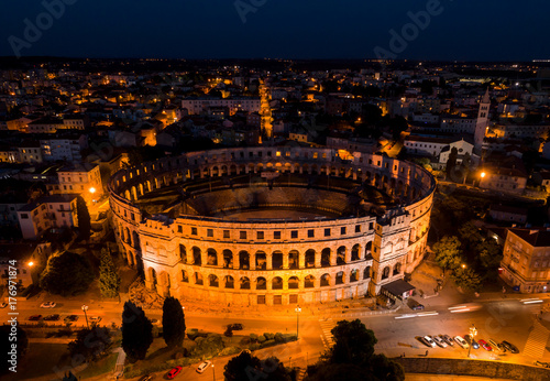 Pula Arena, Croatia - night aerial view taken by a professional drone