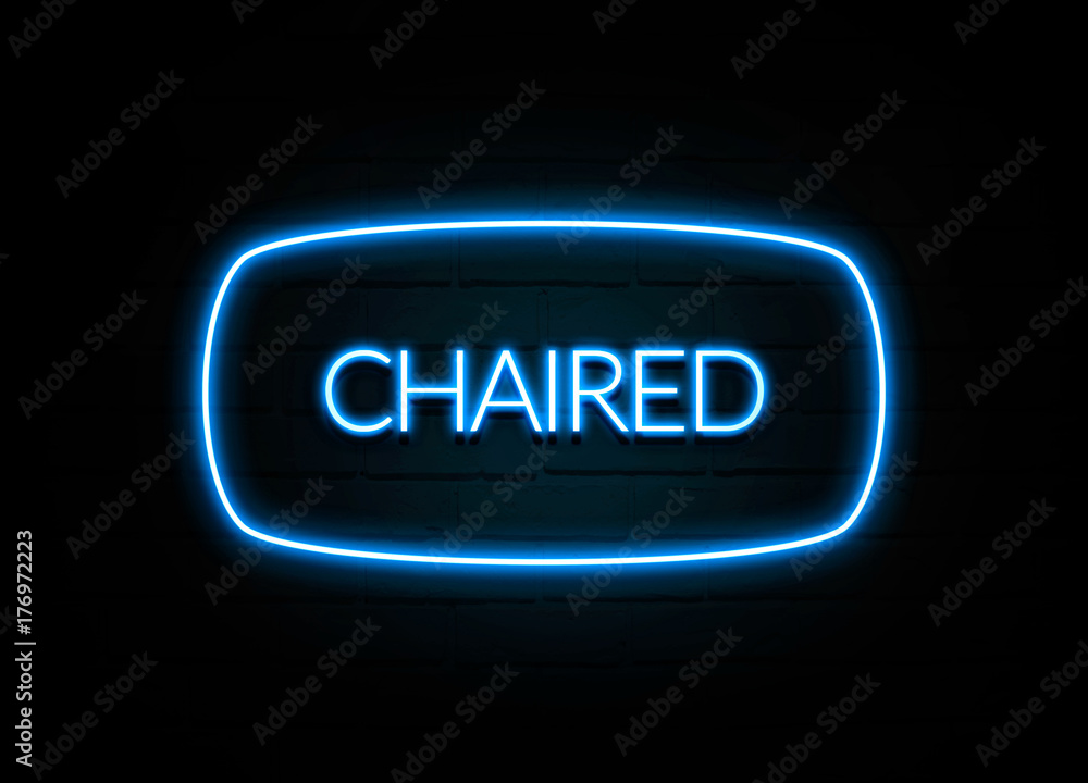 Chaired - colorful Neon Sign on brickwall Chaired - colorful Neon Sign on brickwall