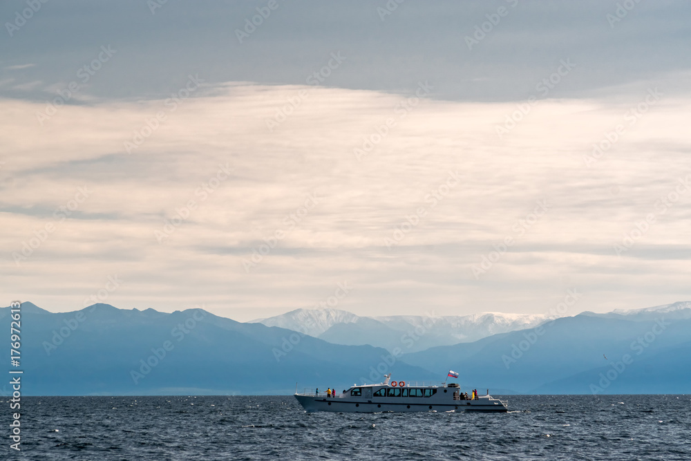 Passenger boat sails on Lake Baikal